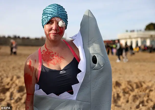 Over 200 swimmers participate in Whitley Bay's traditional New Year's Day dip to mark 2026