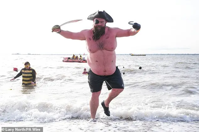 Over 200 swimmers participate in Whitley Bay's traditional New Year's Day dip to mark 2026