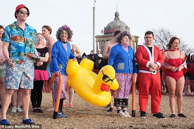 Over 200 swimmers participate in Whitley Bay's traditional New Year's Day dip to mark 2026