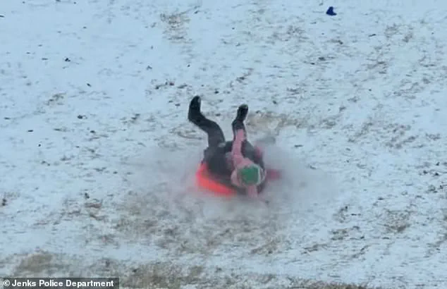 Oklahoma Police Officer's Accidental Sled Collision with Child Goes Viral, No Injuries Reported