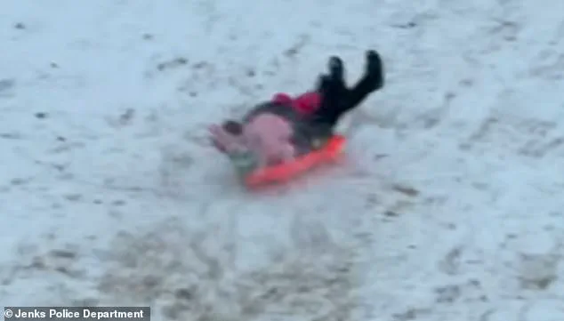 Oklahoma Police Officer's Accidental Sled Collision with Child Goes Viral, No Injuries Reported