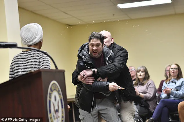 Trump supporter Anthony Kazmierczak alleged to have sprayed vinegar-like liquid at Congresswoman Ilhan Omar during Minneapolis town hall meeting