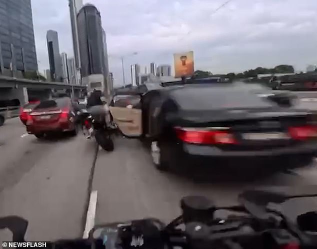 Toddler's Sudden Door Opening Triggers Harrowing Crash Involving Two Motorcyclists on Malaysian Motorway
