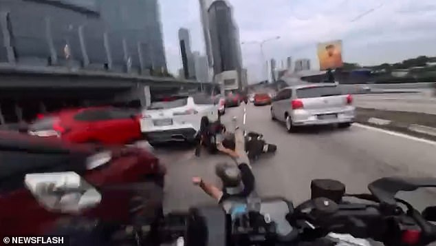 Toddler's Sudden Door Opening Triggers Harrowing Crash Involving Two Motorcyclists on Malaysian Motorway