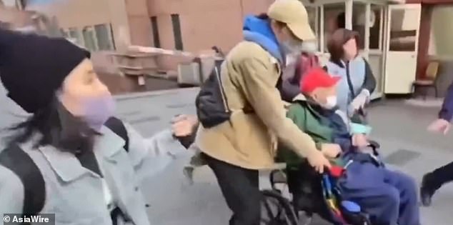 Family Feud Erupts Outside Taipei Hospital as Centenarian Tycoon's Wife Attempts Forcible Removal, Prompting Police Intervention