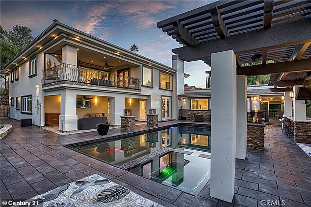 Armed intruders raid $3M LA home during Twitch streamer's gathering.