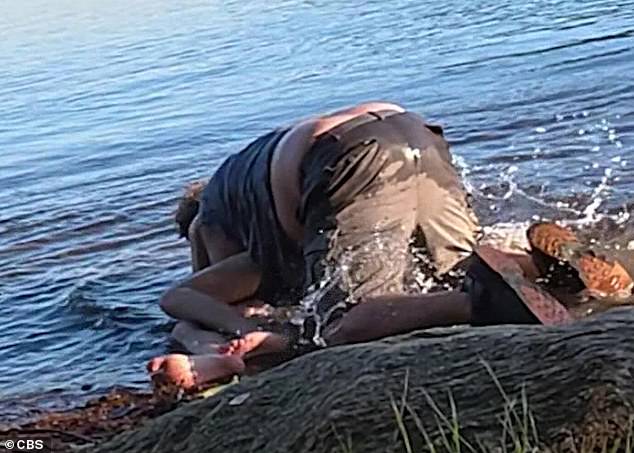 Massachusetts man charged with attempted murder after trying to drown jet ski rider.