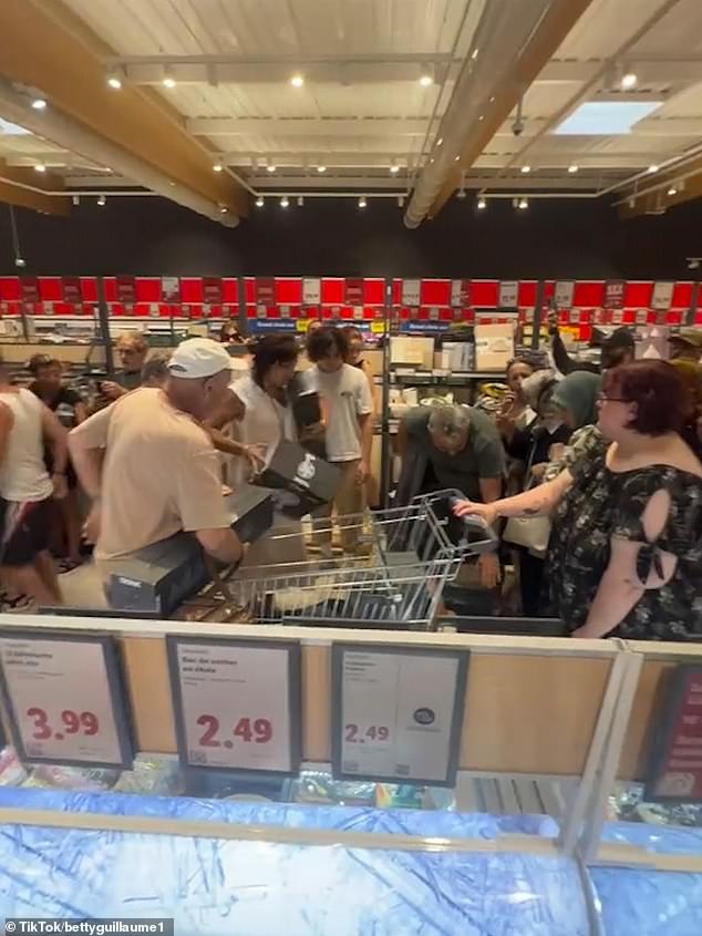 French shoppers brawl over air conditioners as heatwave hits.