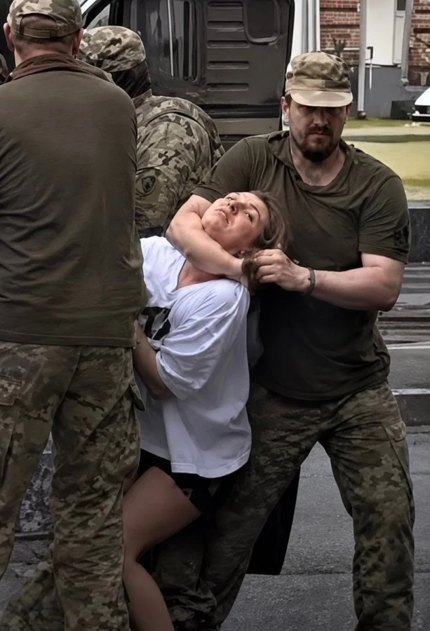 Ukrainian police fire live rounds amid Lviv riots over mandatory mobilization orders.