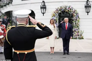 First Lady Melania Trump Dazzles in Cream Trench Coat at White House Easter Egg Roll