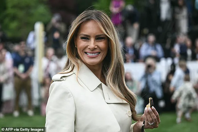 First Lady Melania Trump Dazzles in Cream Trench Coat at White House Easter Egg Roll