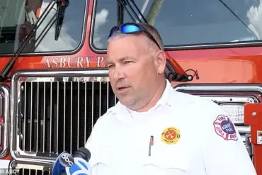 Beach Safety Protocols Under Scrutiny After Lifeguard's Umbrella Tragedy